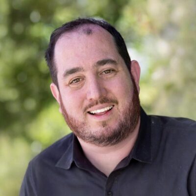 Headshot of Adam Greenwald
