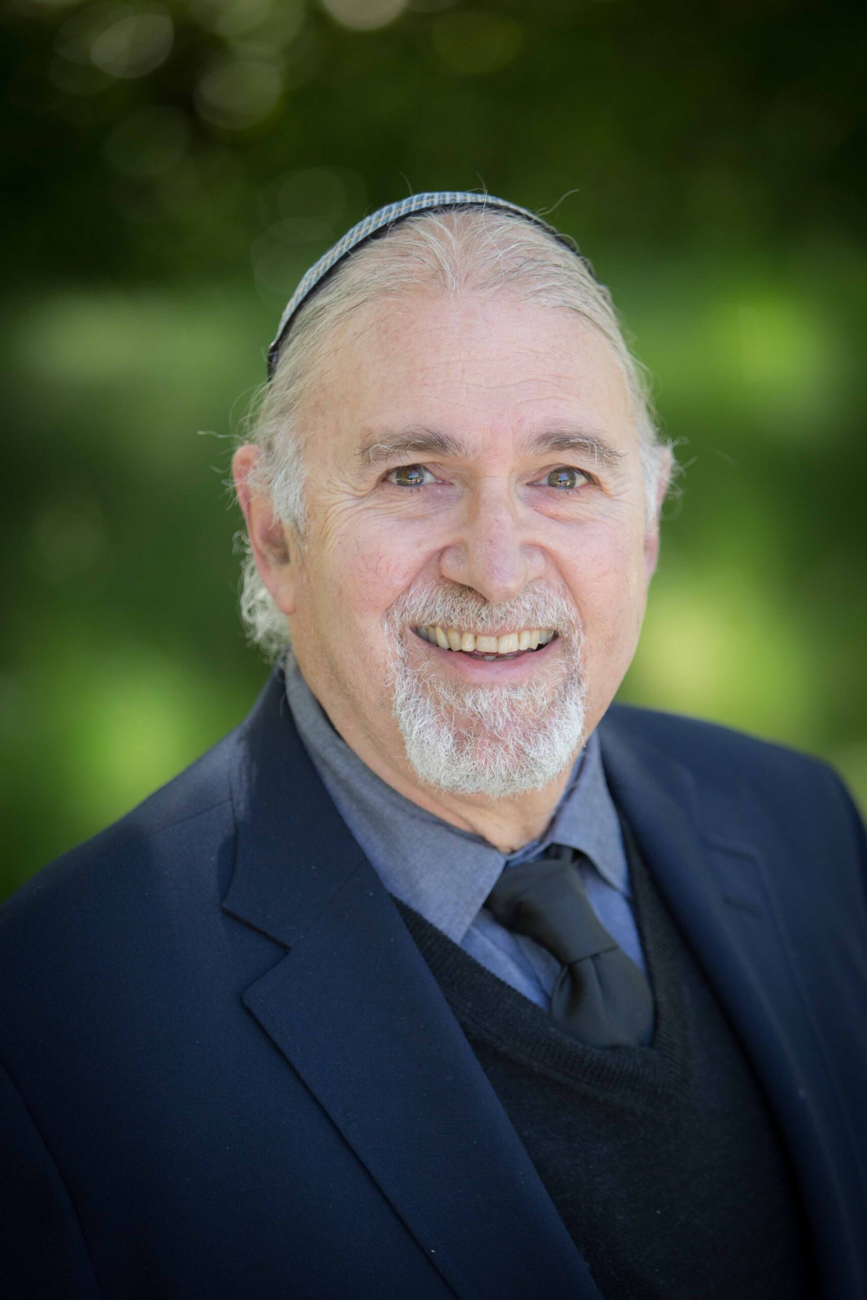 Headshot of Pinchas Giller