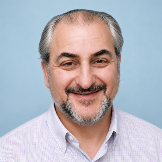 Rabbi Kupchik in a light lavender collared shirt