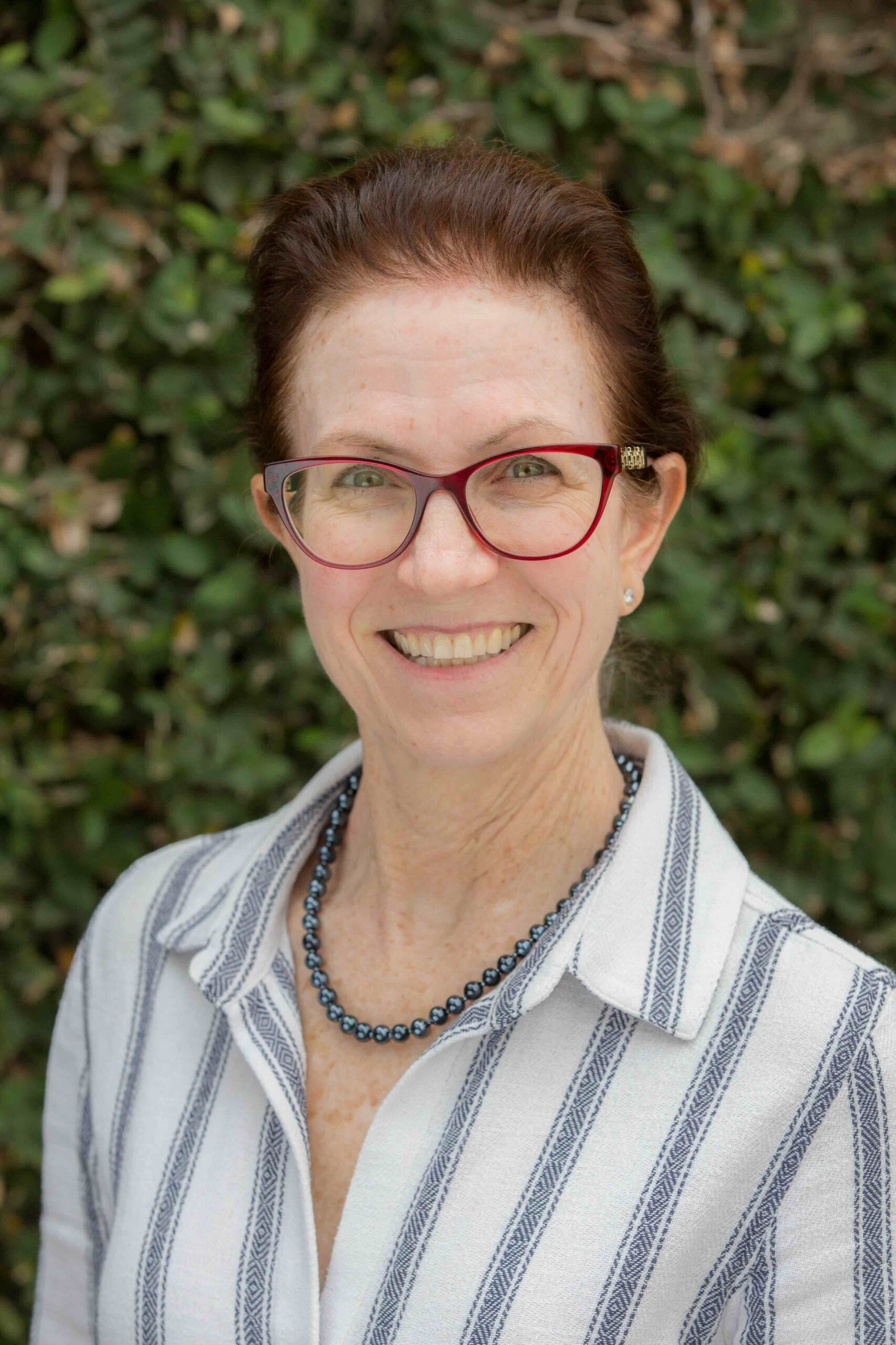 Headshot of Tamar Andrews