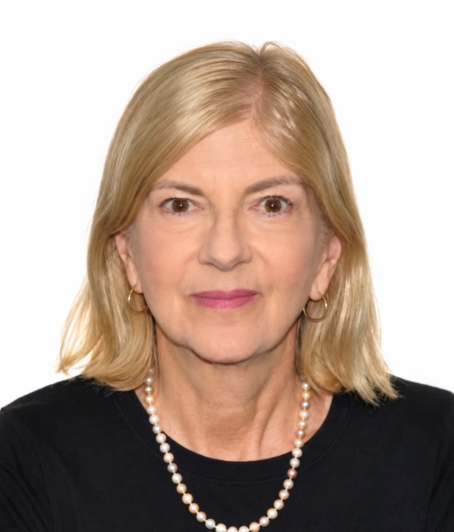 Elaine Goodfriend in a black shirt and long pearl necklace