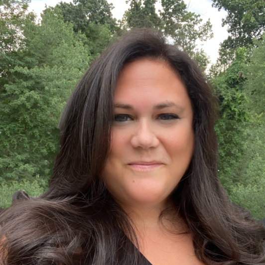 Headshot of Rena Allen in black shirt