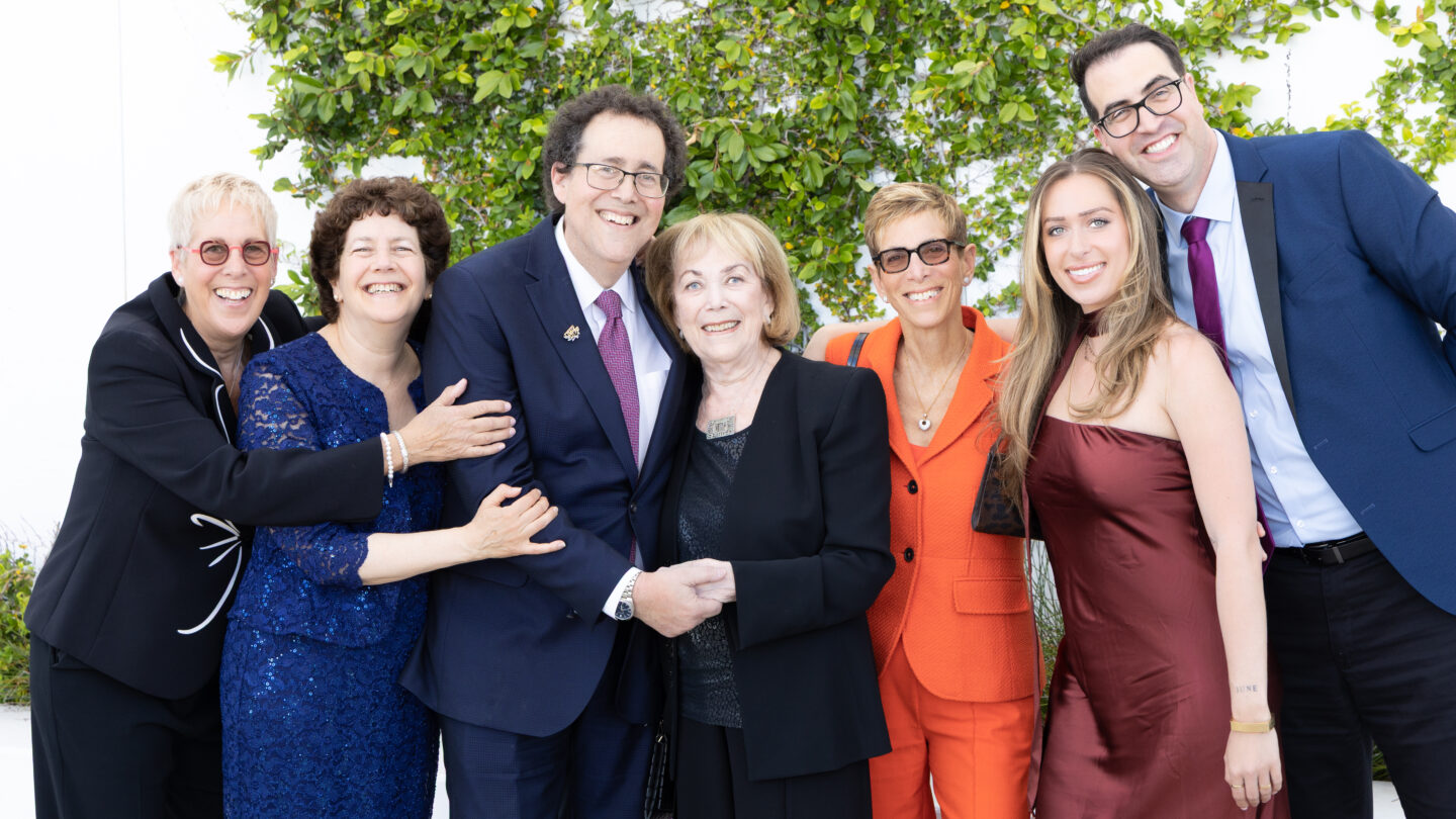 Photo of a multi generational family at an AJU event