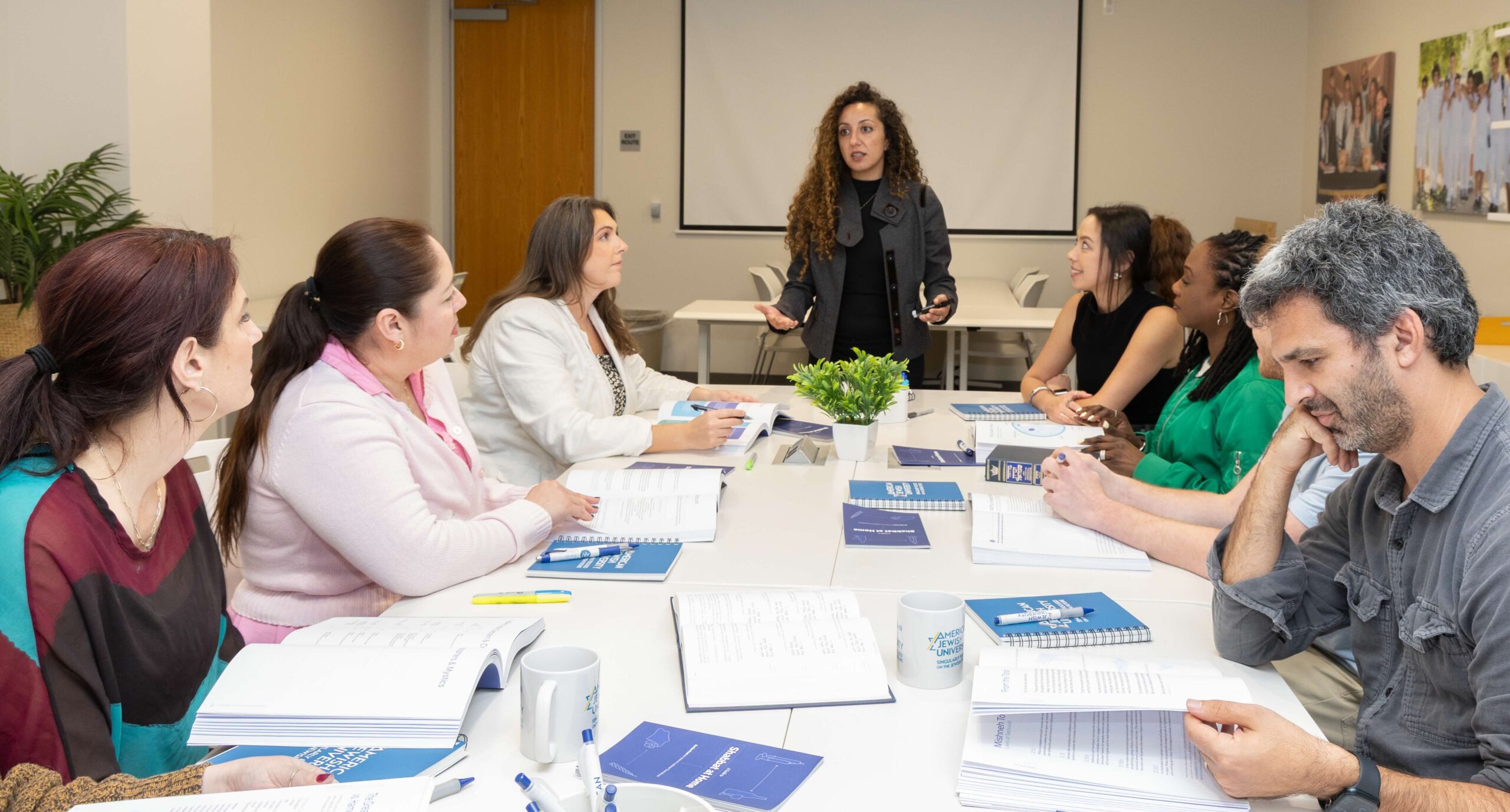 Students in a classroom taking the Intro to Judaism course.